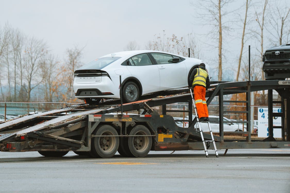 Freight being loaded onto truck for transport